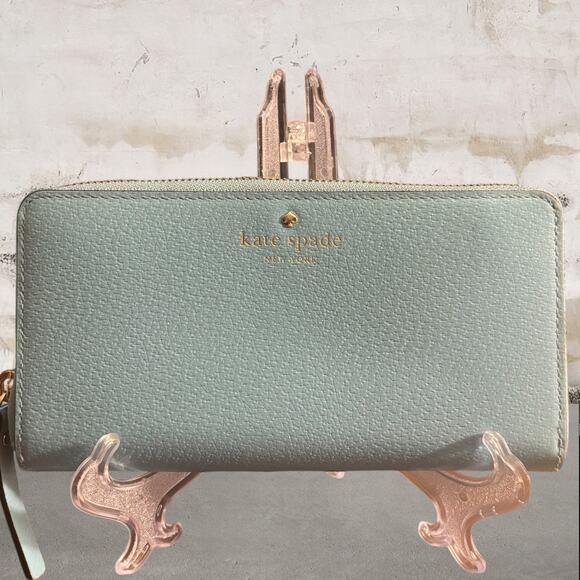 kate spade Handbags - kate spade light blue zip-around pebbled leather wallet EUC